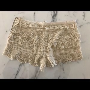 Pins and Needles cream tiered lace shorts